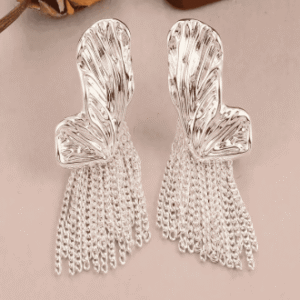 Sculptural abstract gold earrings, artistic jewelry trend 2025