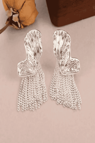 Sculptural abstract gold earrings, artistic jewelry trend 2025